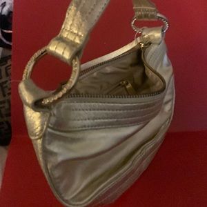 Express Bag with leather straps and decorative loops